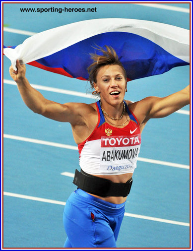 Mariya Abakumova - Russia - 2011 World Champion celebrates with Russian flag